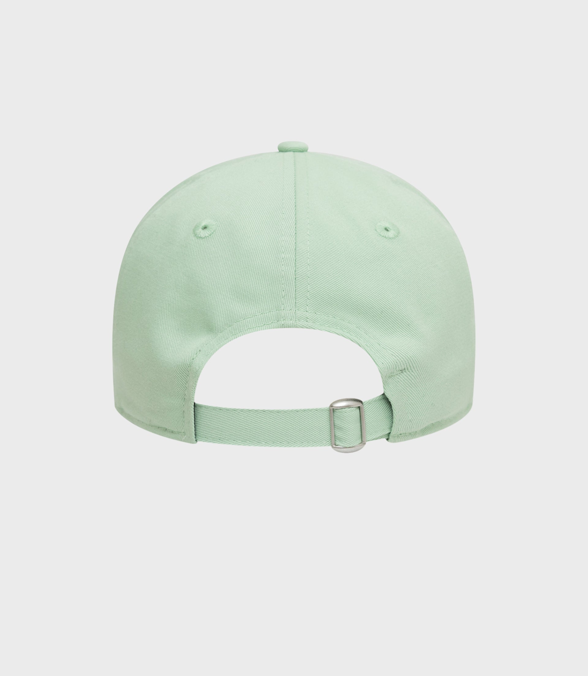 Mint green New Era Alpine 9Twenty cap viewed from the top showing crown seams and center button