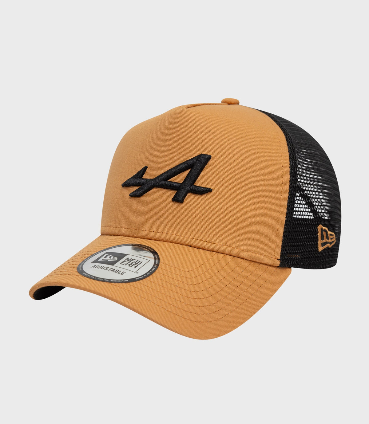 Beige Alpine Seasonal E-Fame Trucker Cap with tan crown and black mesh back, featuring a black embroidered logo on the front