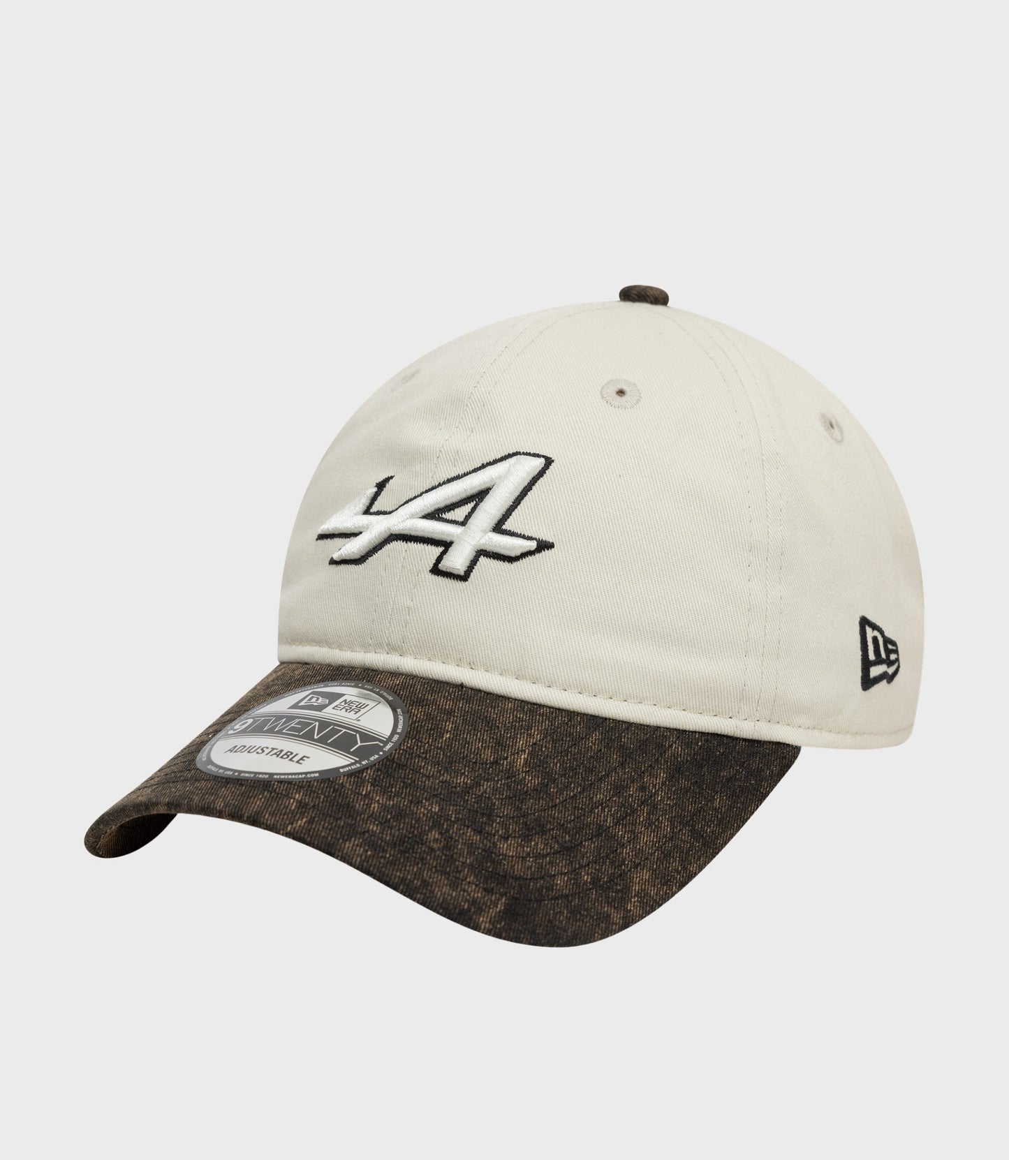 Front view of white Alpine Acid Wash 9Twenty cap with LA embroidery on the crown and brown denim brim with a sticker.