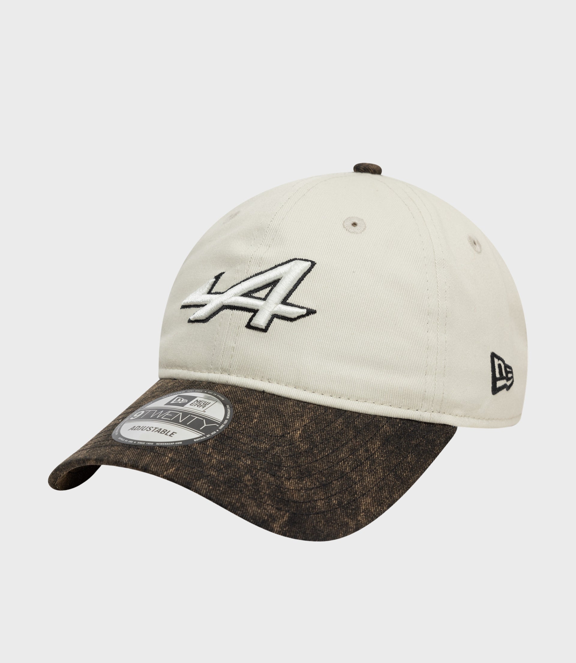 Front view of white Alpine Acid Wash 9Twenty cap with LA embroidery on the crown and brown denim brim with a sticker.