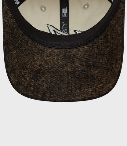 Back view of off white New Era Alpine Acid Wash 9Twenty cap with adjustable strap and brown brim