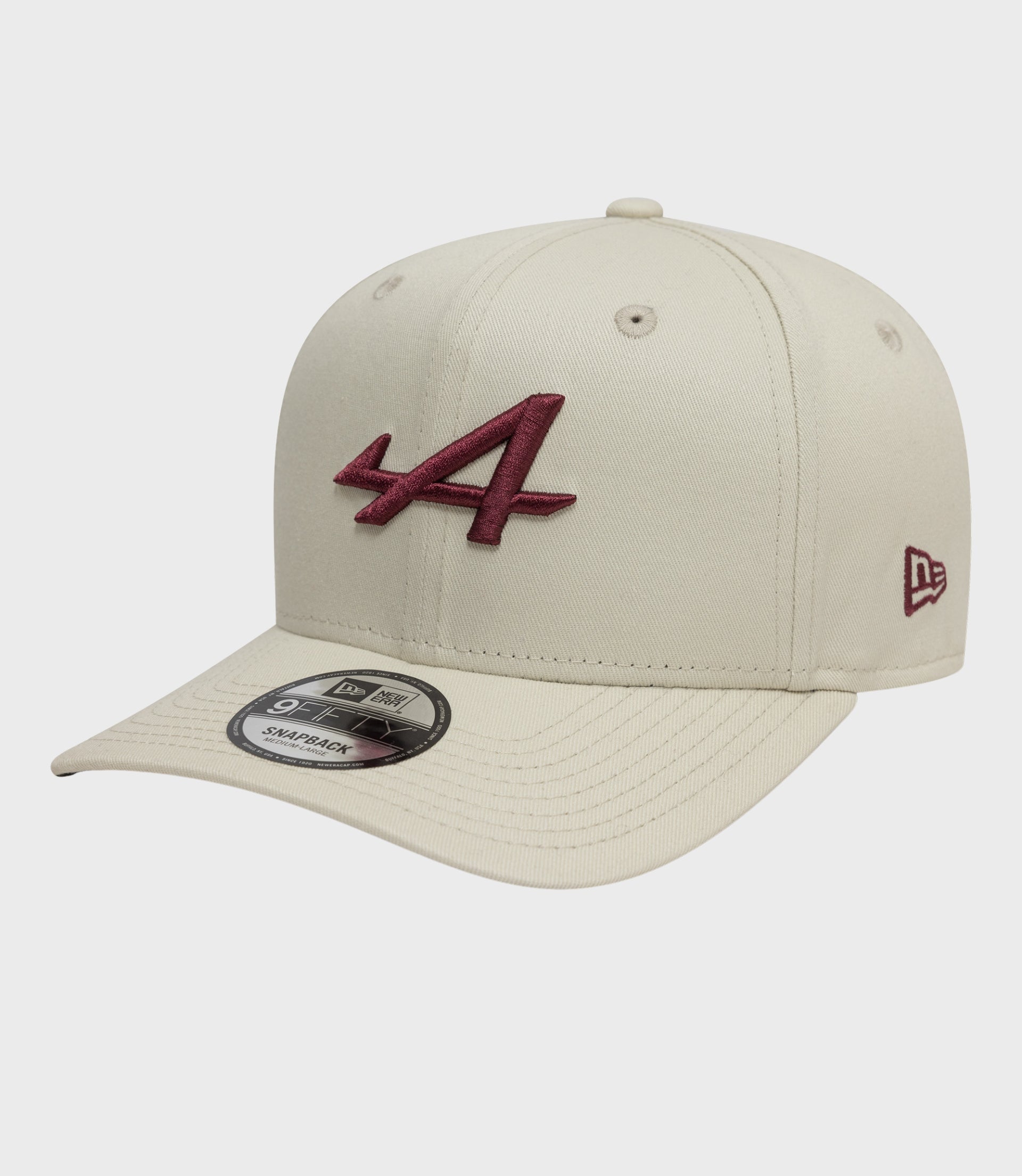 Off-white pre-curved cap with red embroidered logo on the front and sticker on the brim