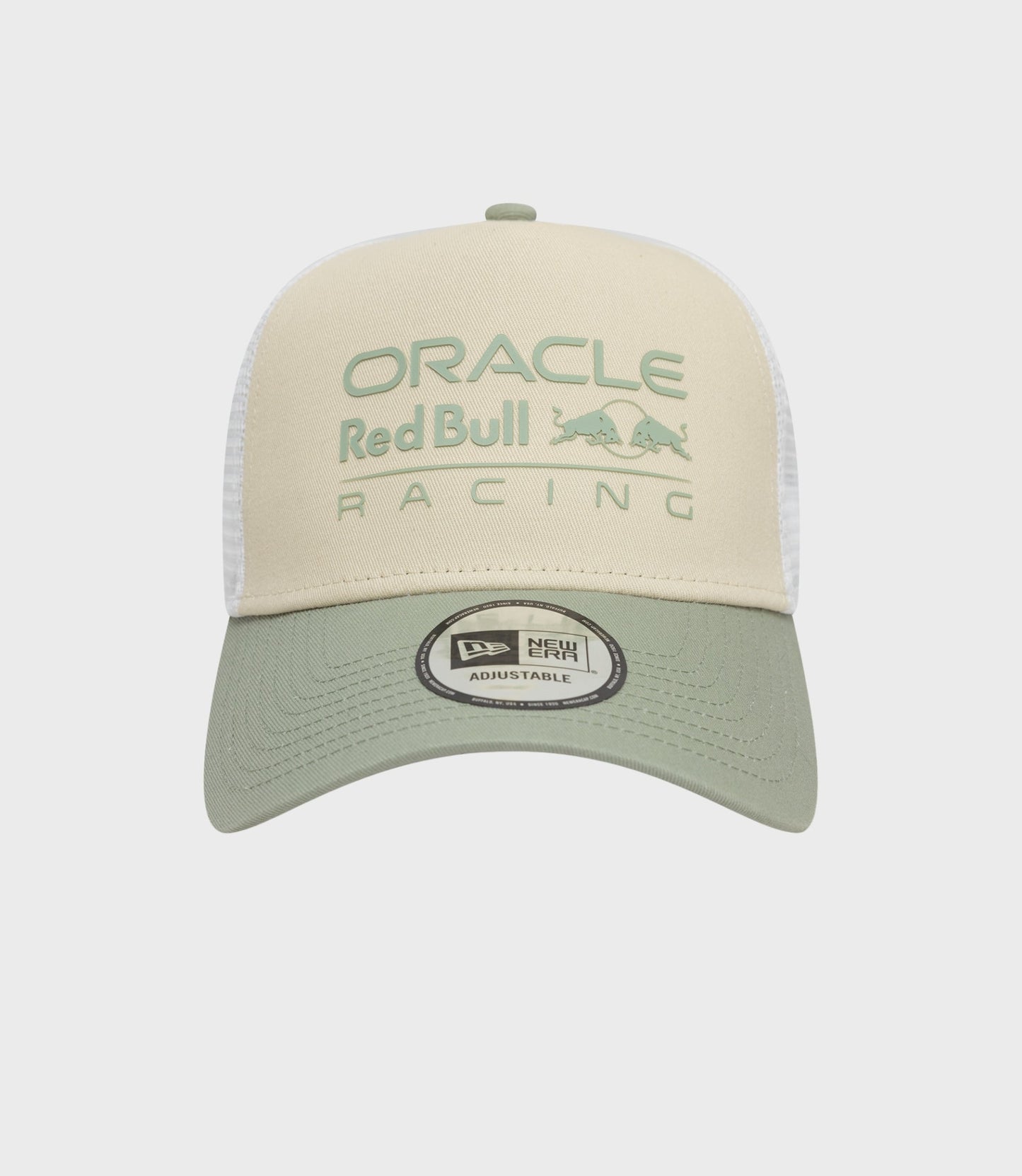 Beige cap viewed from above showing a mint green top button on the crown
