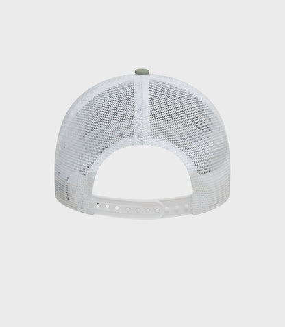 Rear view of beige and white mesh trucker cap with a white adjustable strap