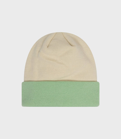 Beige knit beanie with mint green cuff from New Era Oracle Red Bull Racing collection.