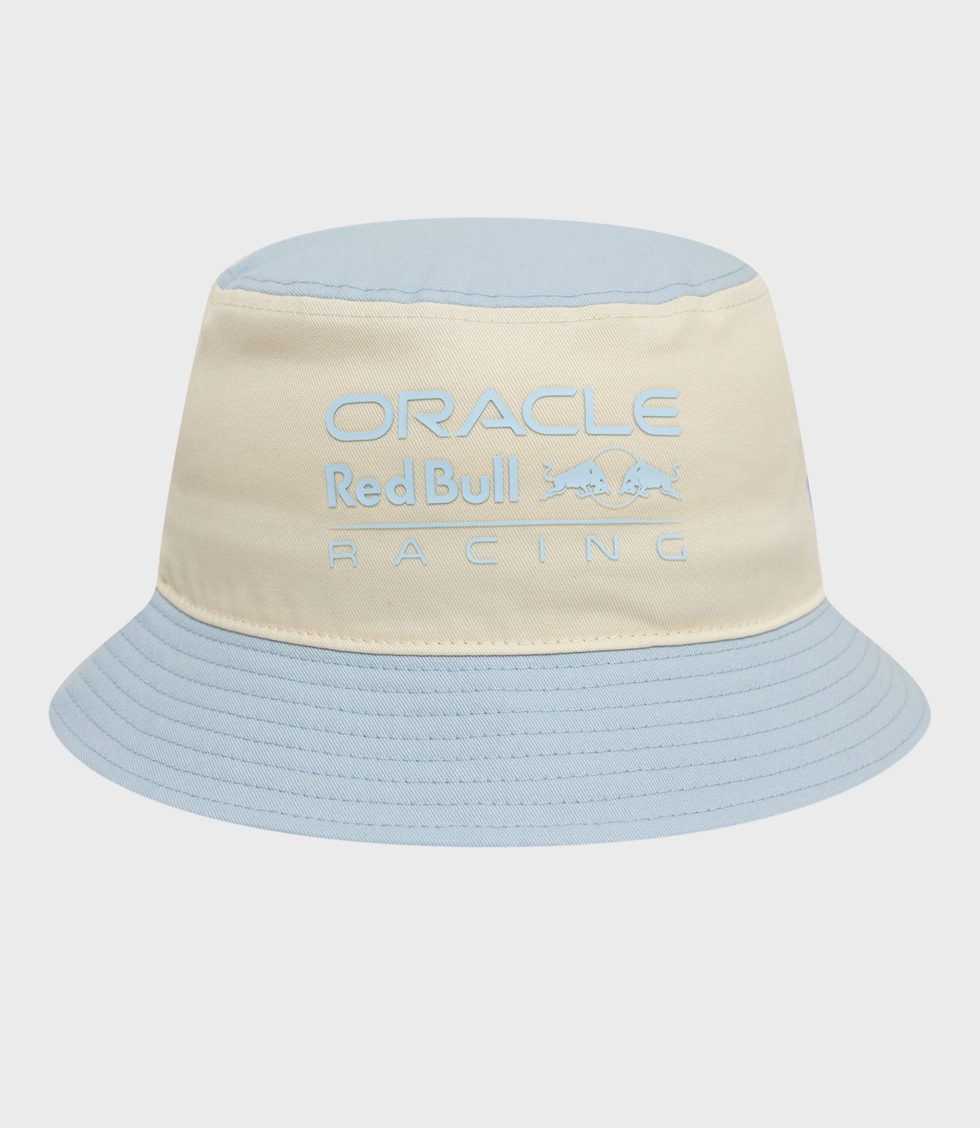 New Era X Oracle Red Bull Racing contrast bucket hat in beige with light blue crown and brim and pale blue branding