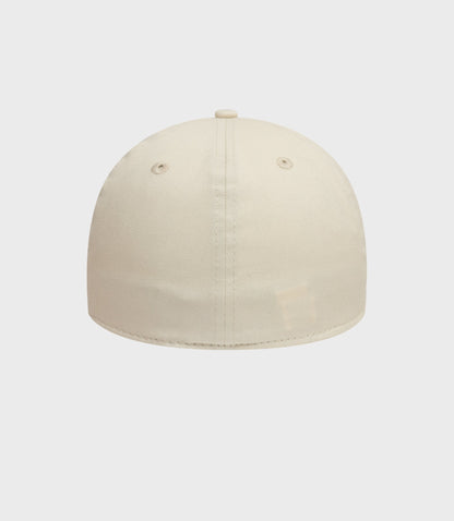 Top view of beige Oracle Red Bull Racing 39Thirty cap showing crown button