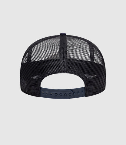 Open back trucker style cap with white front and navy mesh back and curved brim