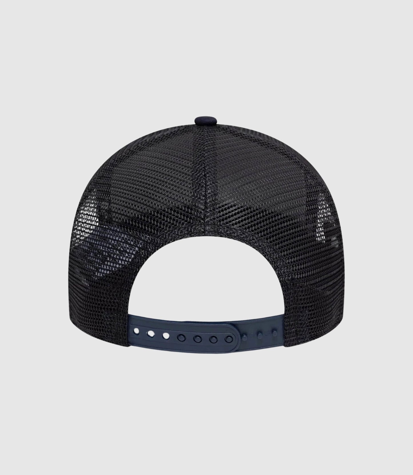 Top view of dark blue cap showing crown seams and small top button