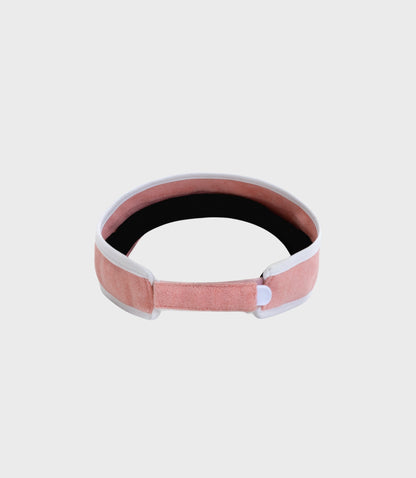 Pastel pink New Era visor cap with white trim and pink inner lining, cropped close