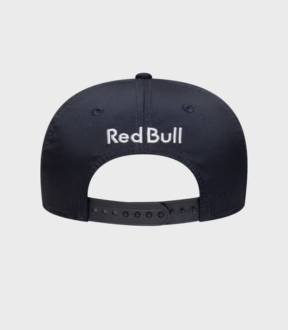 Side view of navy blue 9Seventy cap with red piping and Red Bull Racing badge.