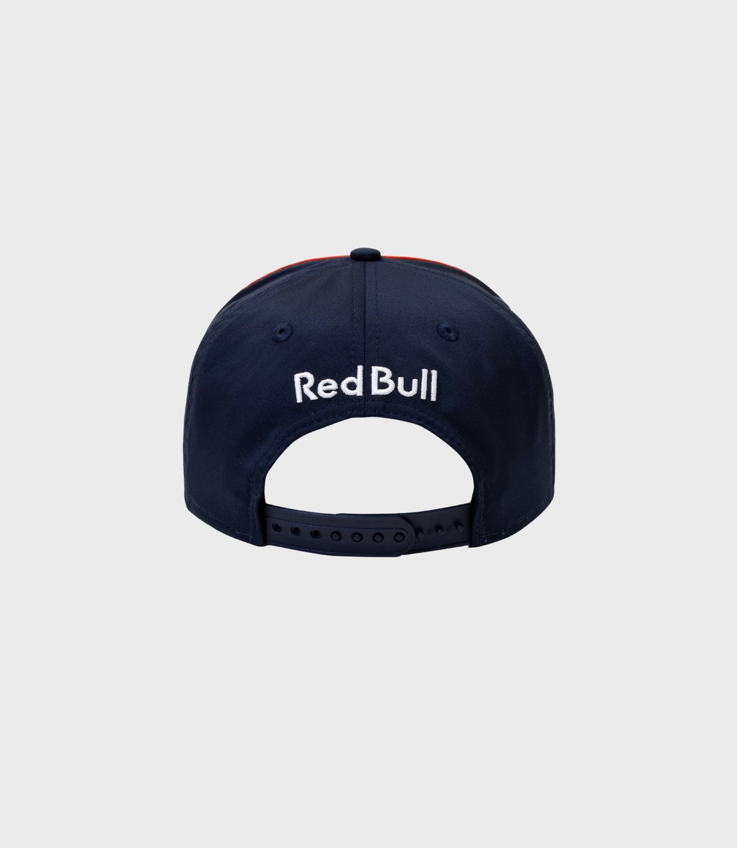 Rear view of the dark blue 9Seventy cap showing the adjustable strap and Red Bull logo embroidered on the back.