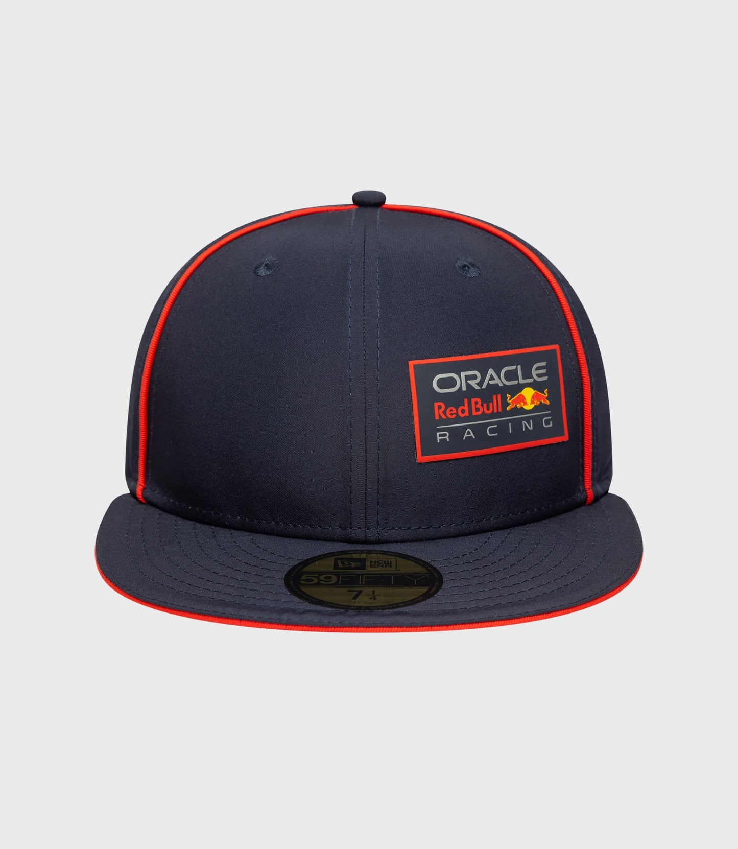 Navy blue 59FIFTY cap viewed from the front with red piping along seams and Oracle Red Bull Racing badge.
