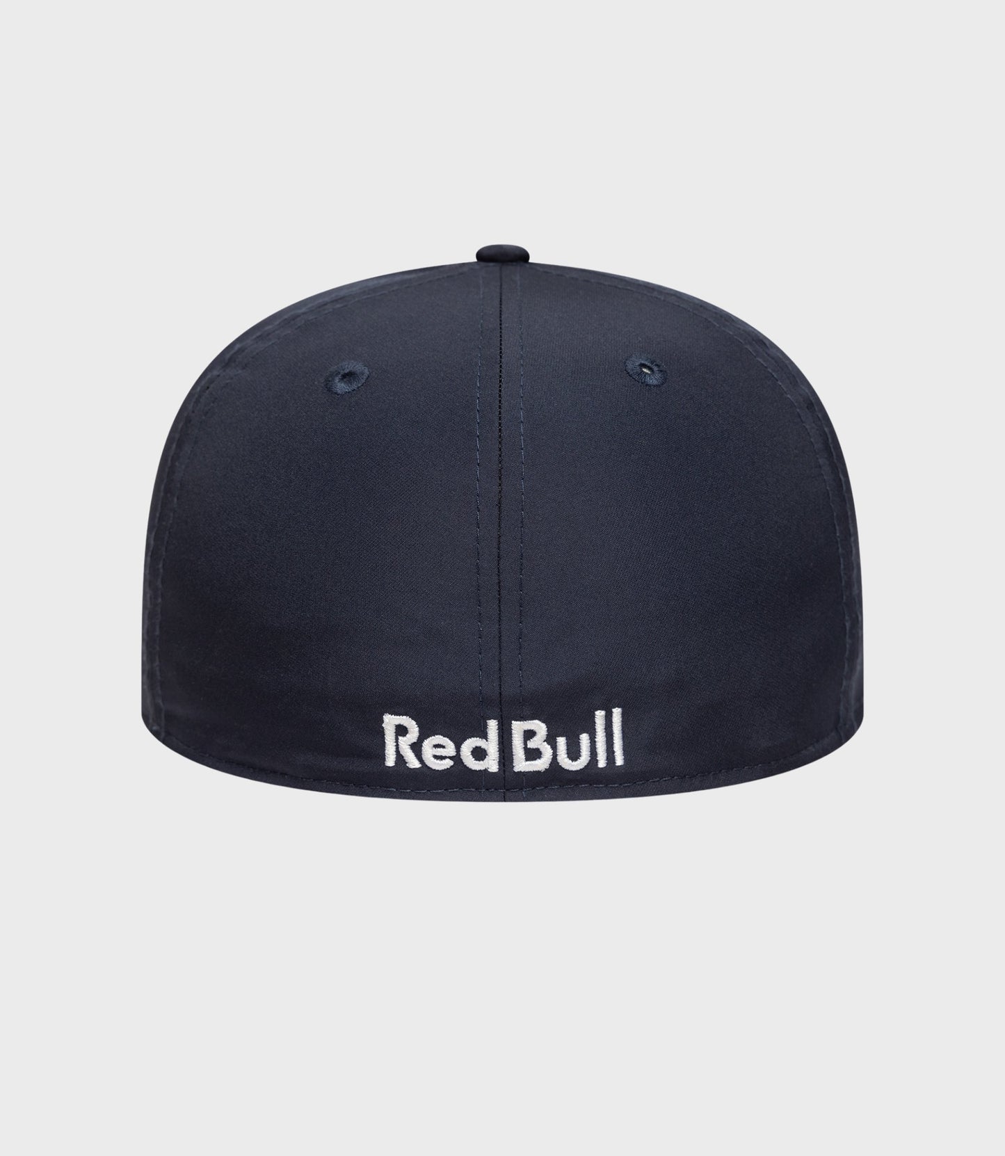 Top view of a dark blue New Era 59Fifty cap crown with a small button at the center.
