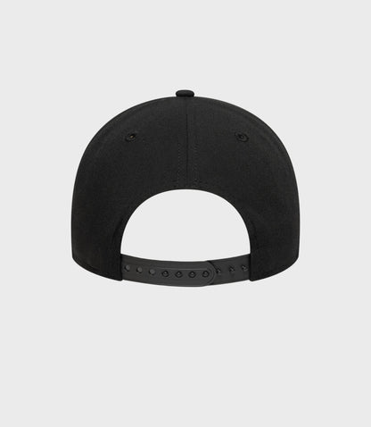 Rear view of black Estretch Snapential 9Forty cap showing adjustable snapback strap