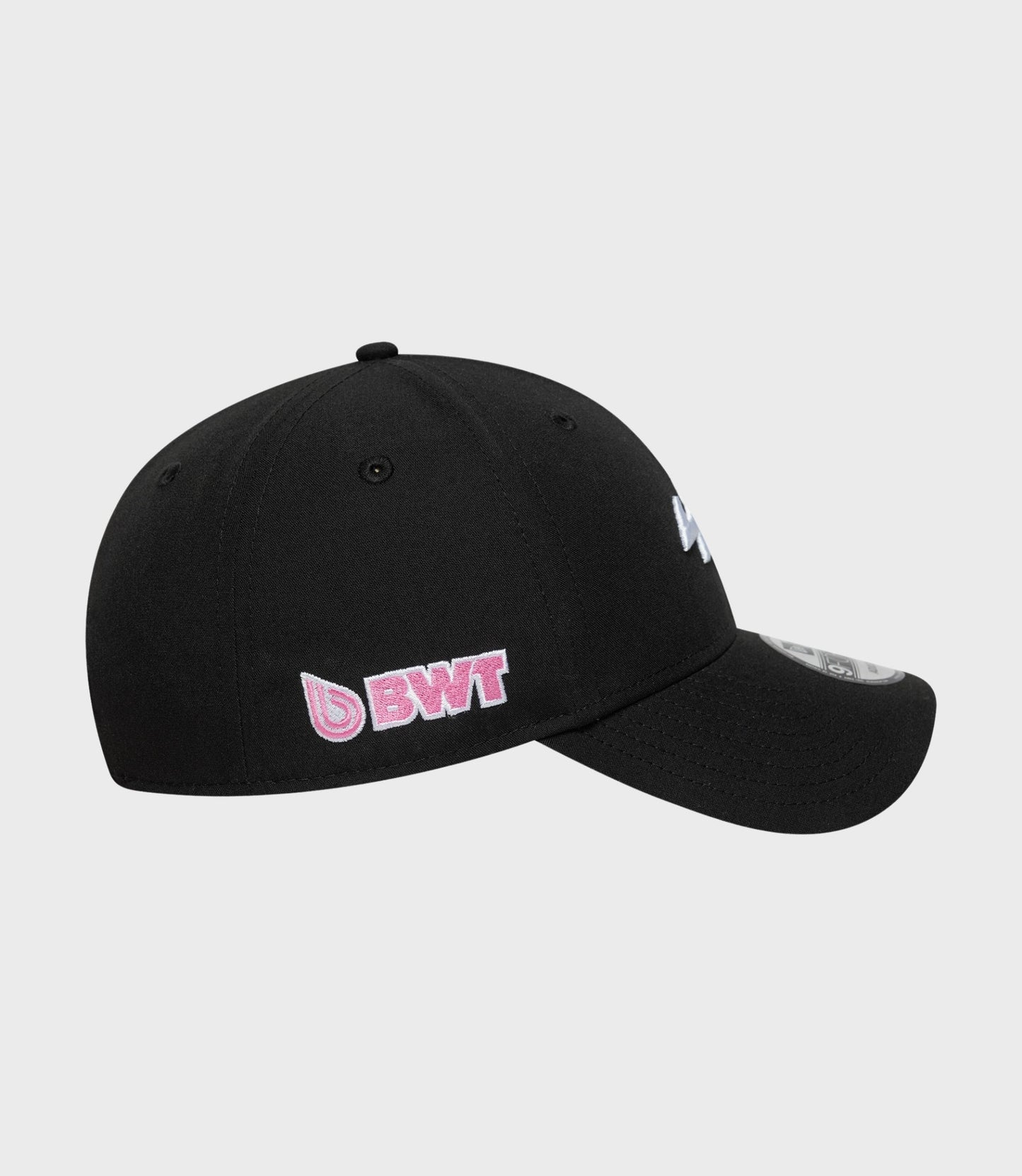 Three quarter view of black New Era Estretch Snapential 9Forty cap with front embroidery and curved brim