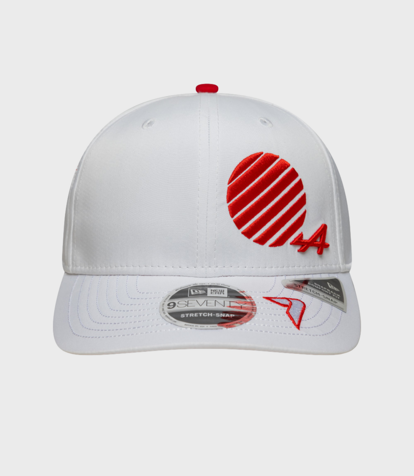 White Alpine 9Seventy cap with a red crown button and a red striped patch on the side