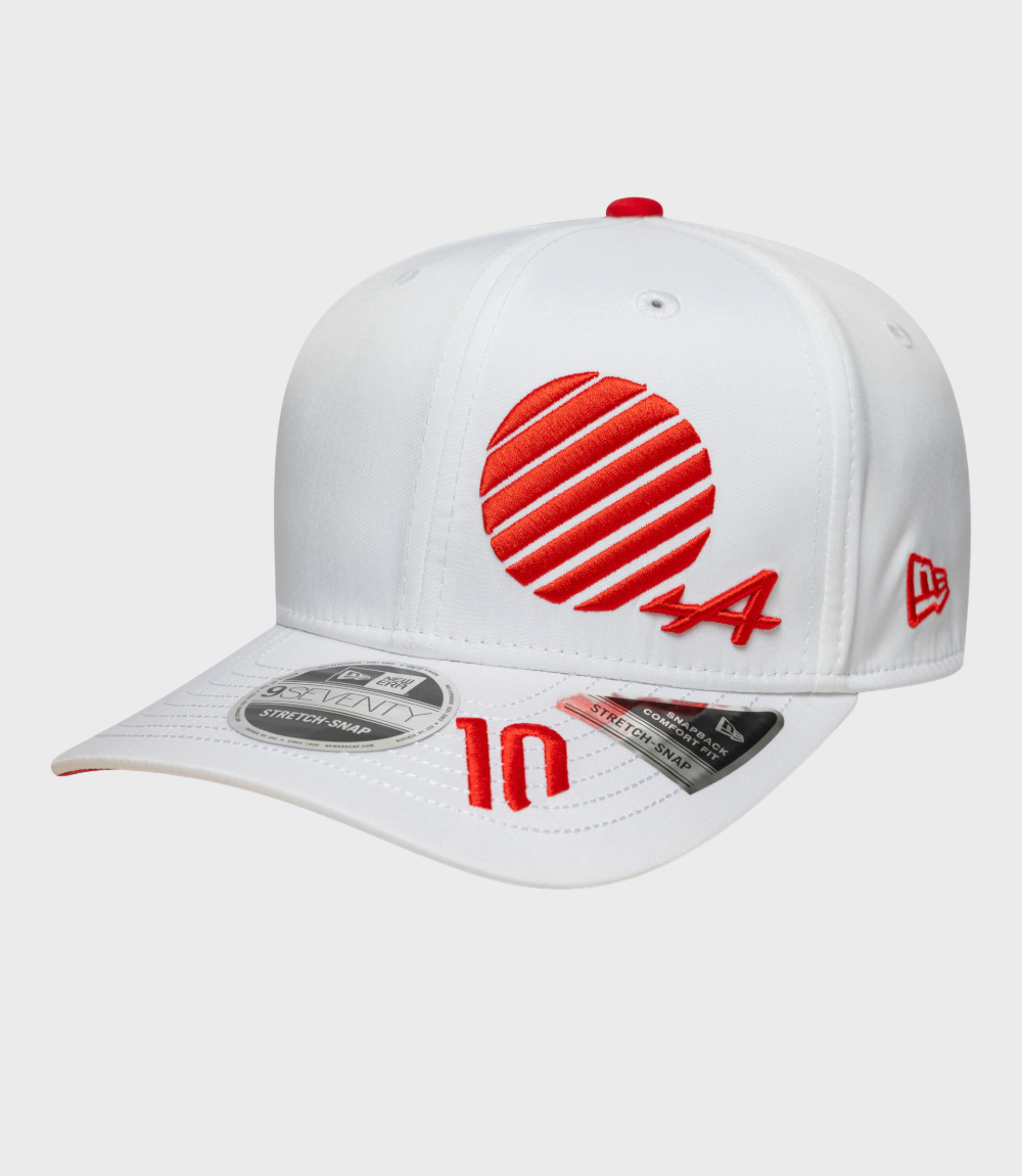 White New Era 9Seventy cap with red embroidery on the front panel and a curved brim with stickers