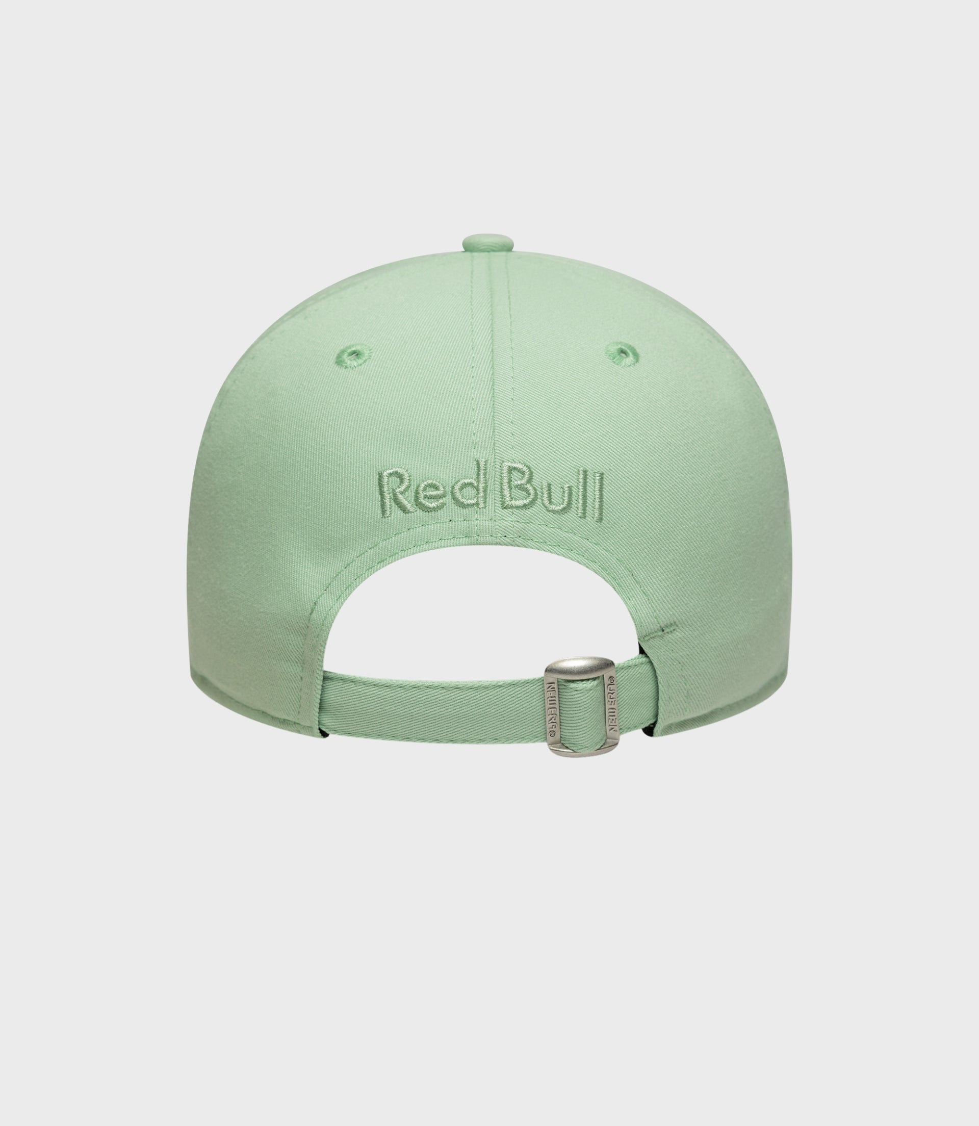 Top view of pastel green cap with crown button and ventilation eyelets