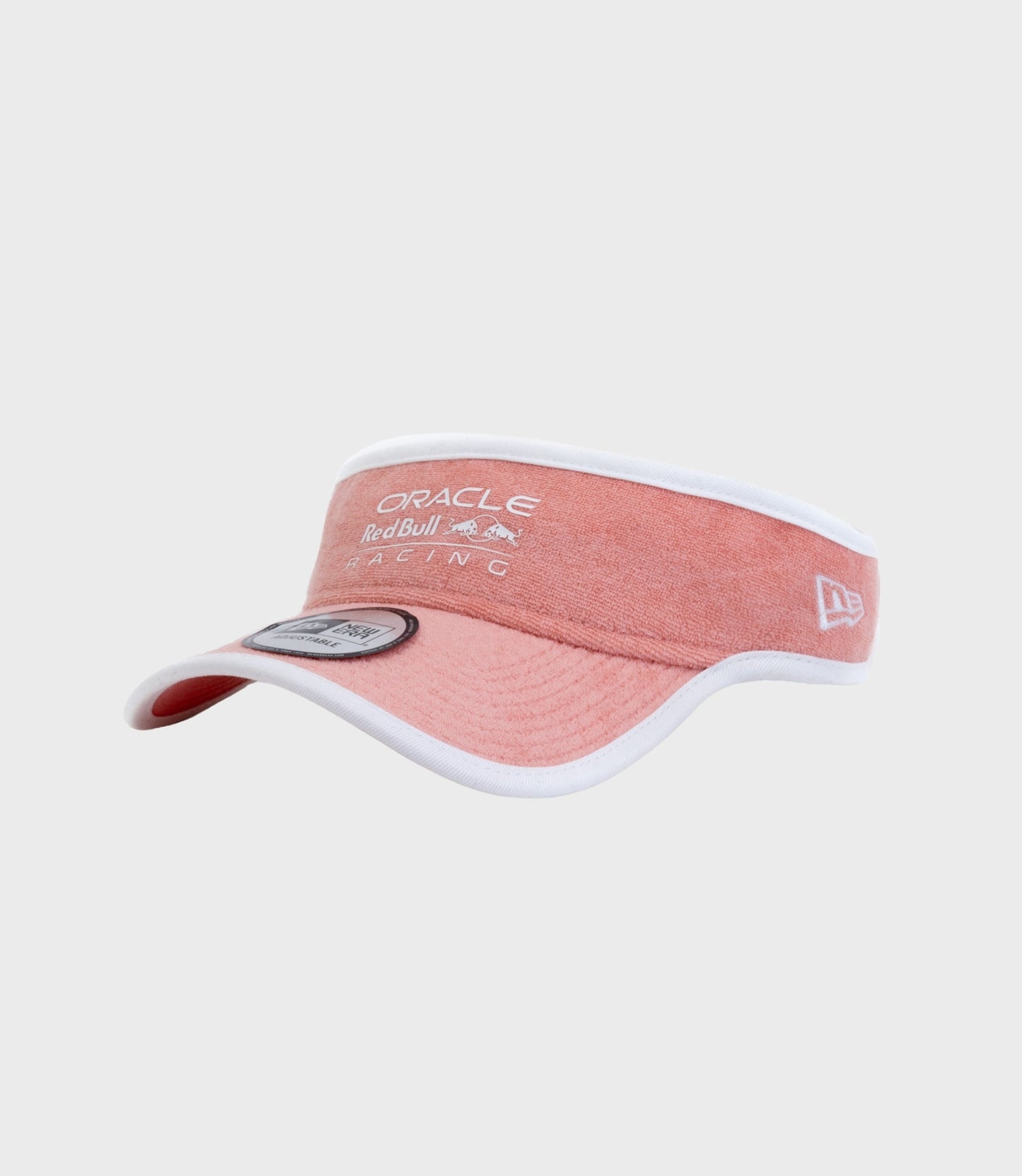Pastel pink New Era Oracle Red Bull Racing Miami visor cap with white trim and front logo