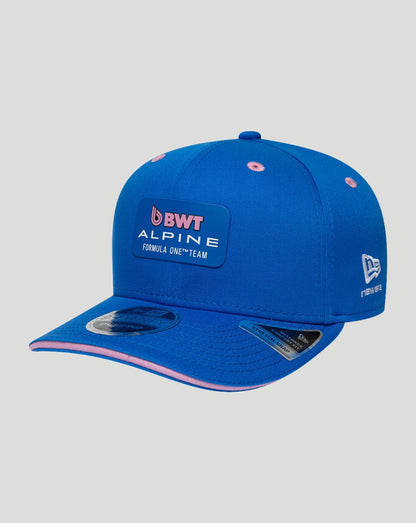 Blue New Era cap with BWT Alpine Formula One Team patch and pink brim accents