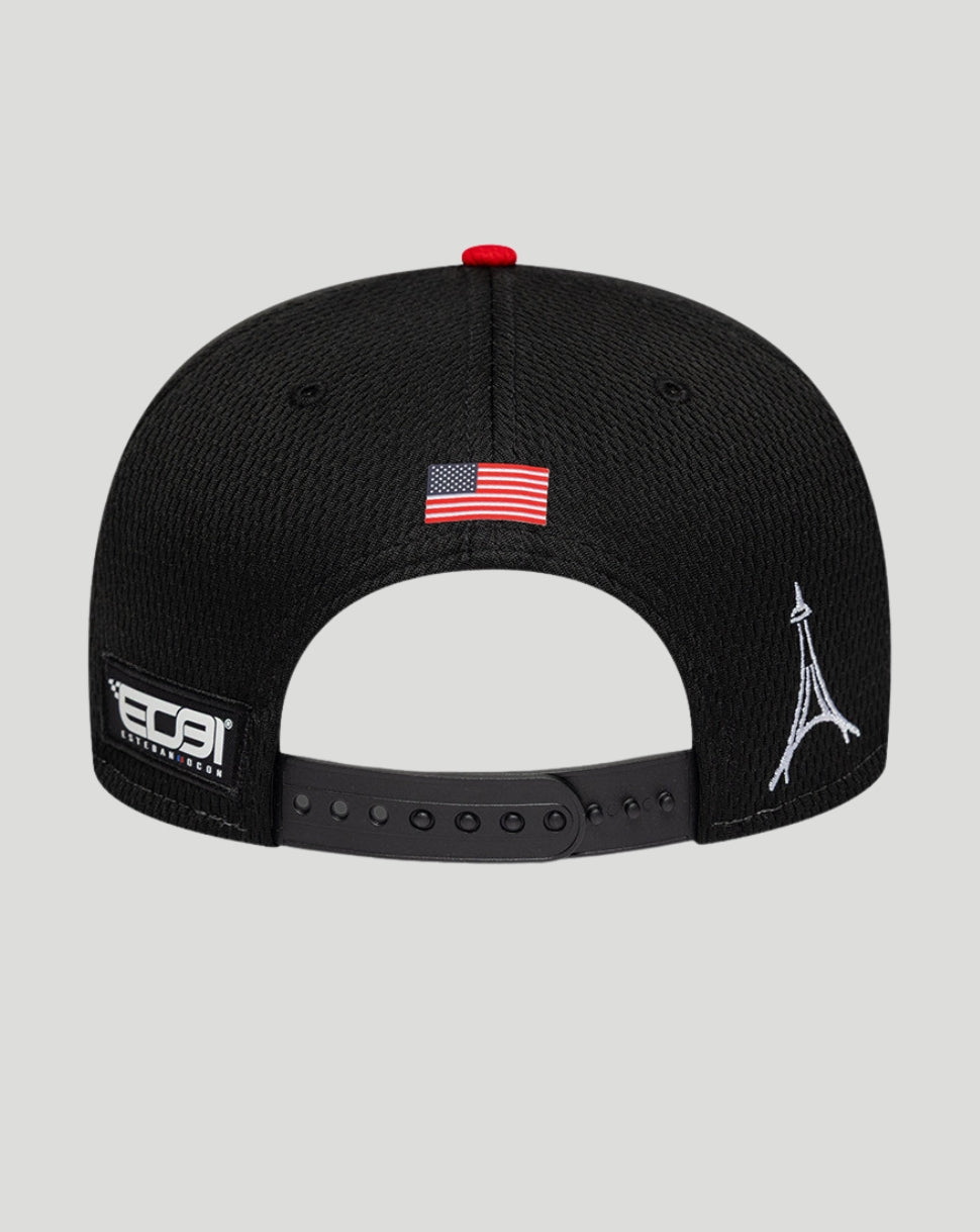Back view of black New Era Haas Esteban Ocon 9Seventy cap with adjustable strap and American flag patch