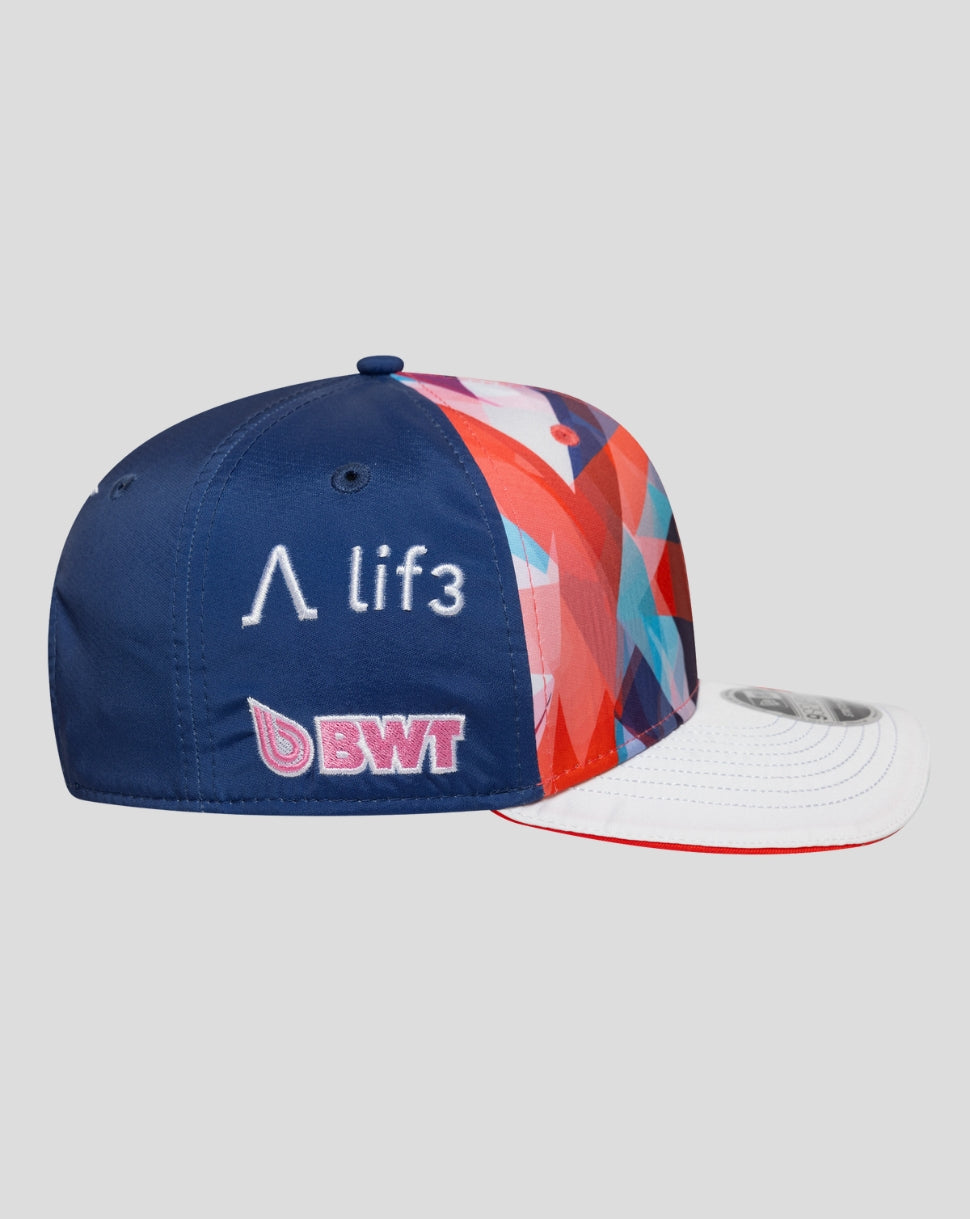 Rear angle of the cap featuring a blue back panel and embroidered branding with the multicolor crown