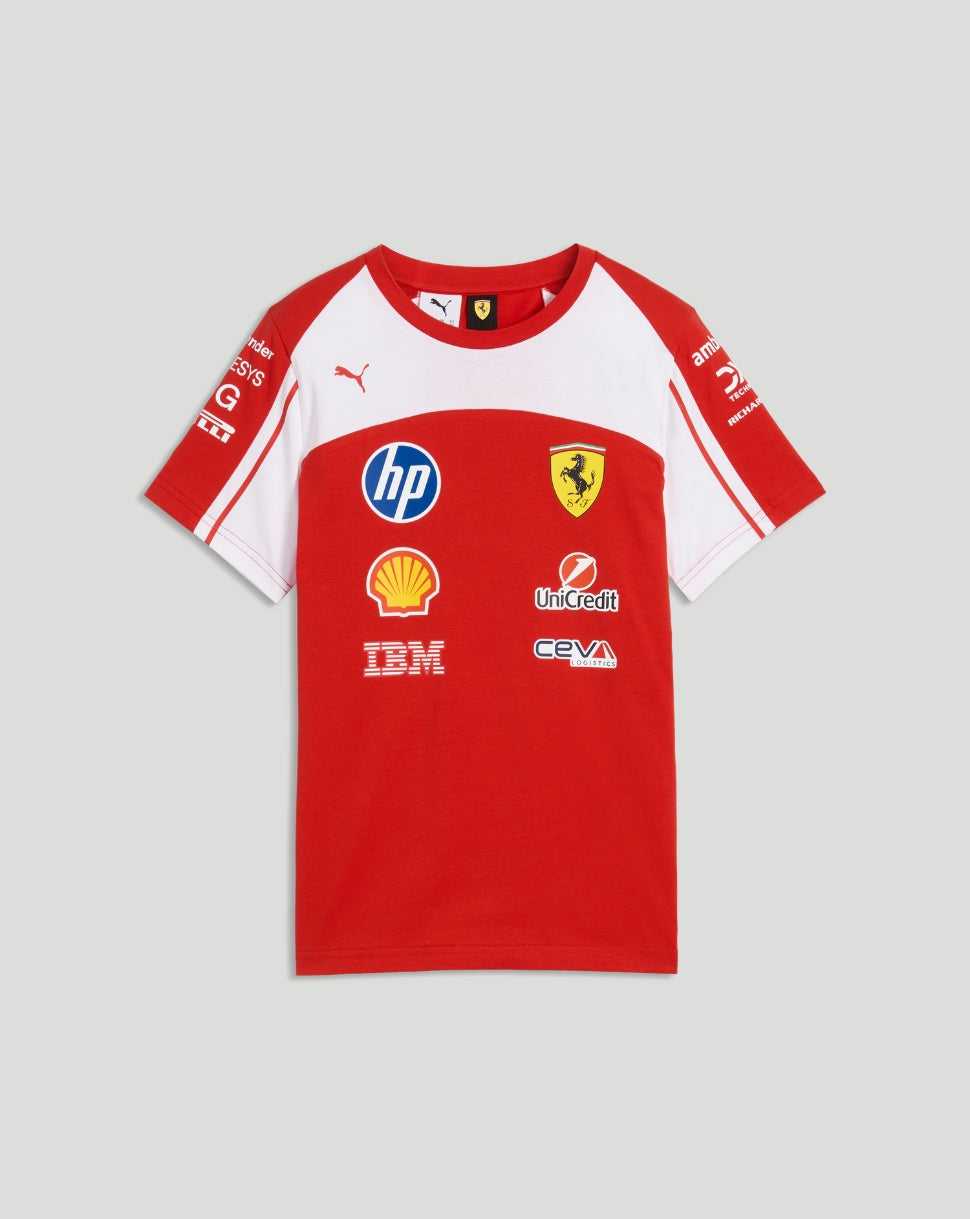 Front view of a red Scuderia Ferrari junior team T shirt with white shoulders and multiple sponsor logos.