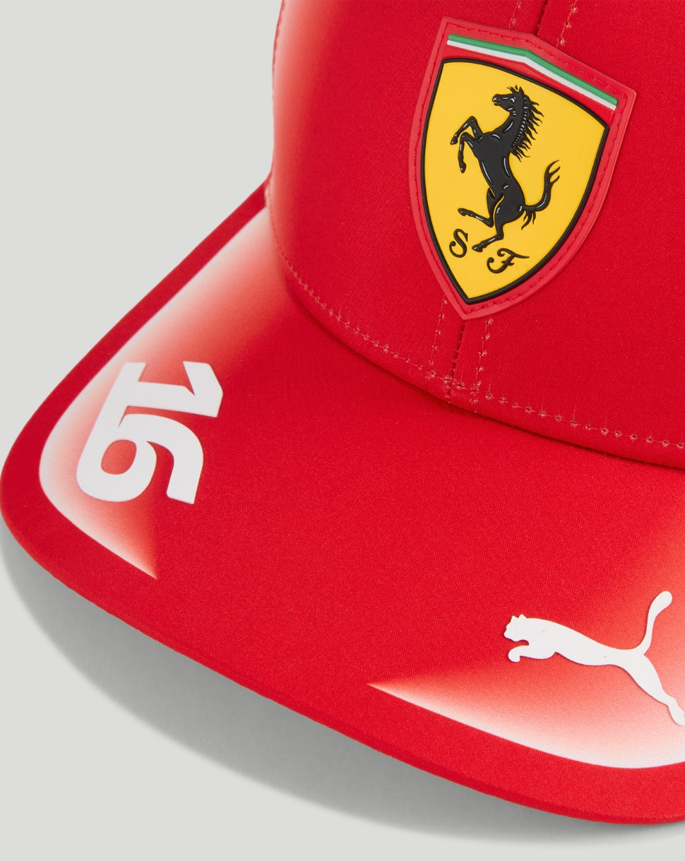 Red Scuderia Ferrari youth cap with yellow shield logo and white 65 graphic on the curved brim