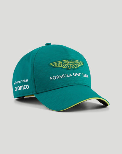 Green Aston Martin F1 team cap with yellow wing badge and Formula One Team text and sponsor logos on the side