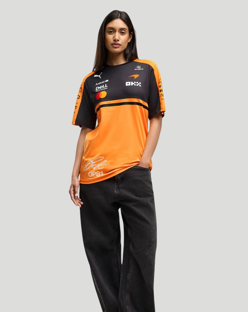 Front view of McLaren Men's Team Piastri T-Shirt in Papaya orange with black panels and sponsor logos.