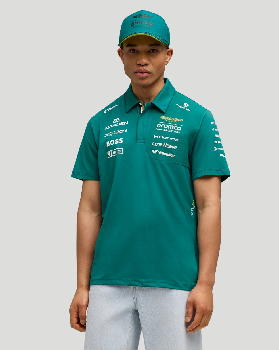 Male model wearing green Aston Martin F1 team polo with sponsor logos and a teal cap