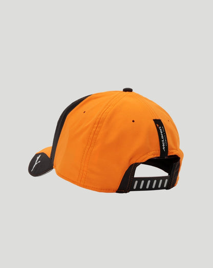 Rear view of orange McLaren Team Piastri cap showing McLaren label on the back strap and adjustable closure with notches