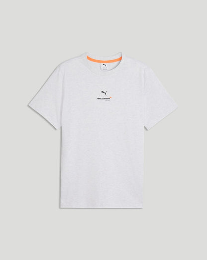 Front view of a white McLaren T Shirt featuring the McLaren Racing logo on the chest and an orange accent at the neckline.