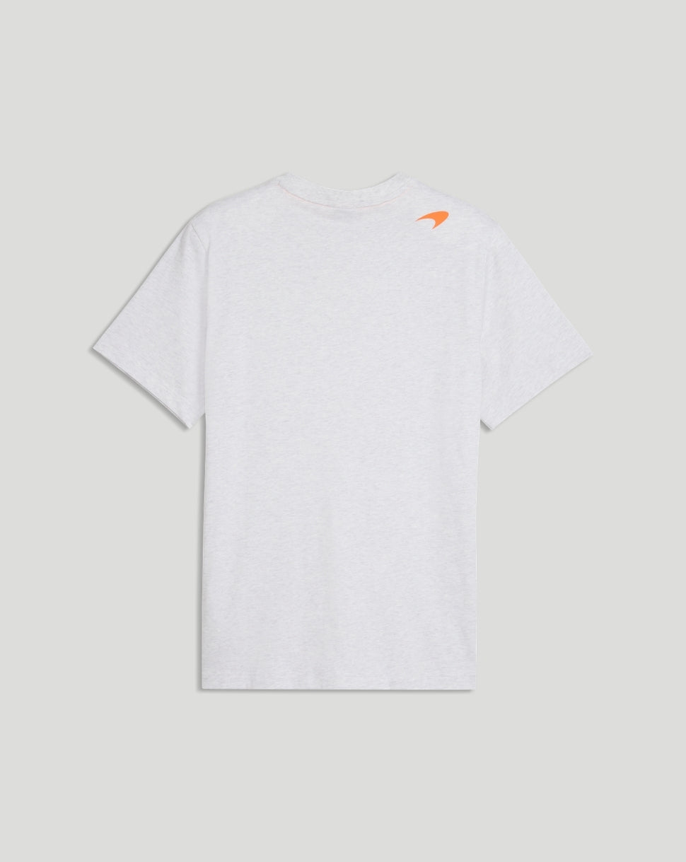 Back view of a white McLaren T Shirt with a small orange logo at the upper back near the shoulder.