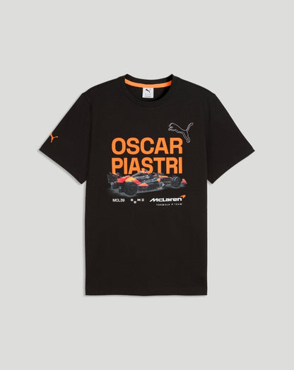 Front view of black McLaren Piastri Core T-Shirt with bold orange Oscar Piastri graphic and racing car imagery.