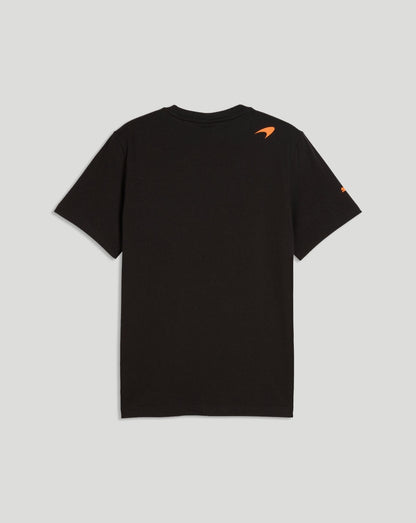 Back view of black McLaren Piastri Core T-Shirt with a small orange logo on the upper back and an orange mark on the sleeve.