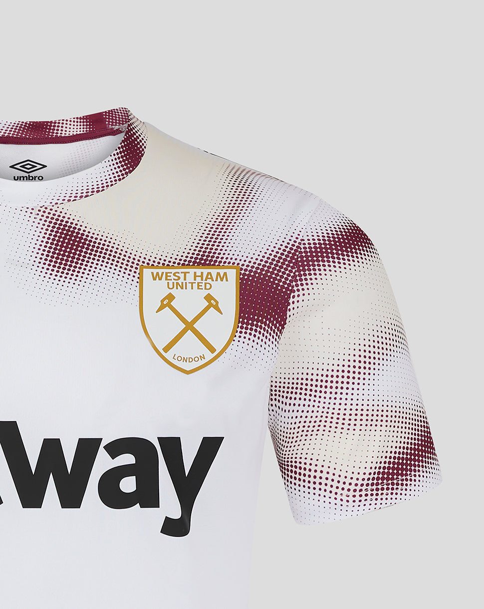 Close up of upper chest on West Ham 24/25 White Warm Up Jersey showing crest and Umbro logo with burgundy dotted pattern