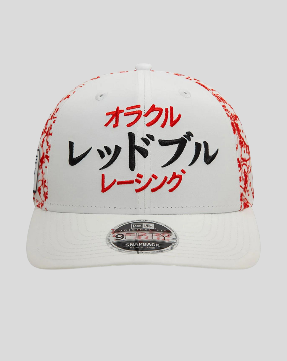 Front view of white Red Bull Racing cap with bold Japanese script on the crown and blossom print along the sides curved visor