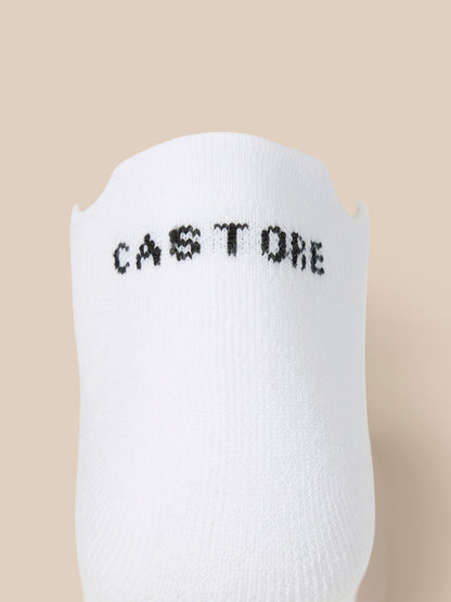 Close up of a white Castore X Tufnell trainer liner sock with CASTORE lettering.