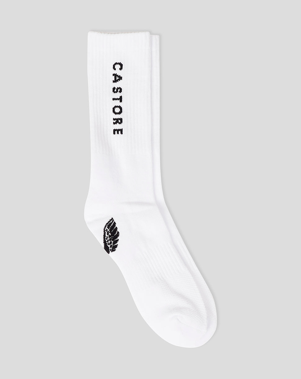 White Cushioned Crew Sock with CASTORE branding and a leaf logo near the heel