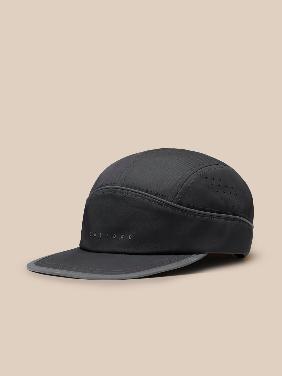 Front view of gunmetal Unisex Elevated Cap with Castore wordmark and curved brim