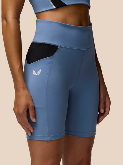 Apex Training Cycle Shorts in Dove Blue with black mesh side panels and a white Castore logo on the left leg