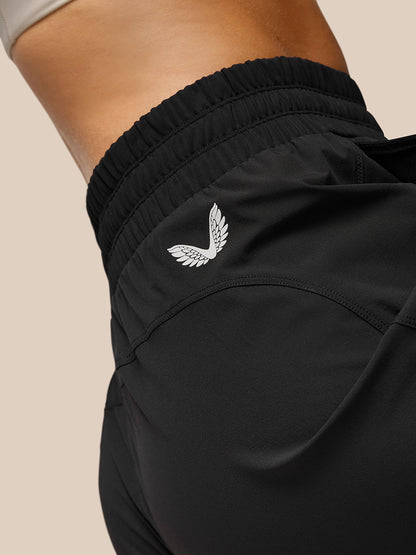 Close-up of black Flow Training Joggers waistband and hip area with Castore branding and ProTek text along the leg