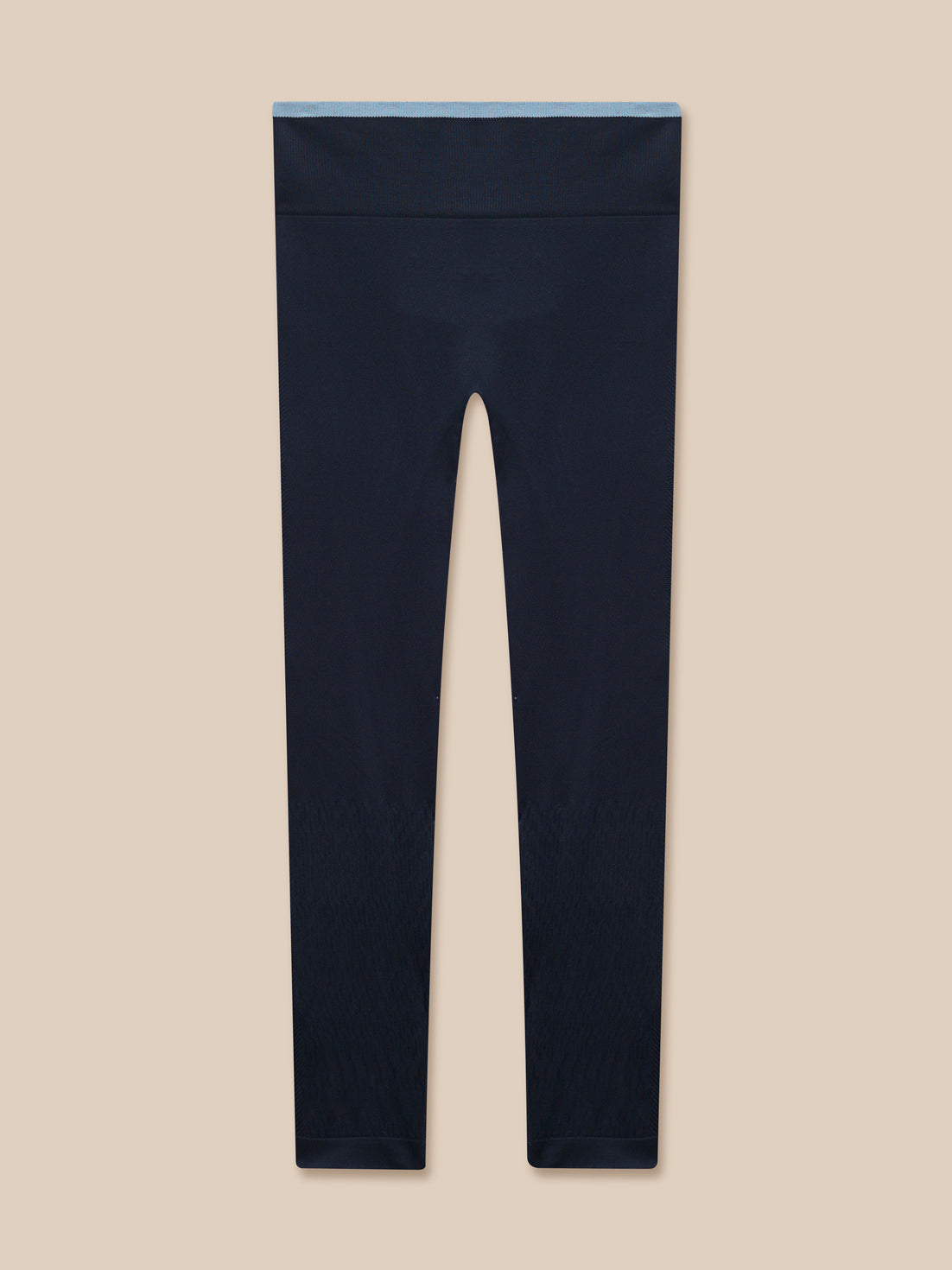 Full view of Flow Training ⅞ Length Seamless Leggings in Midnight Navy with a light blue waistband edge