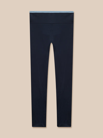 Full view of Flow Training ⅞ Length Seamless Leggings in Midnight Navy with a light blue waistband edge