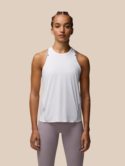 Woman wearing Zone Training Tank Top in White with racerback design