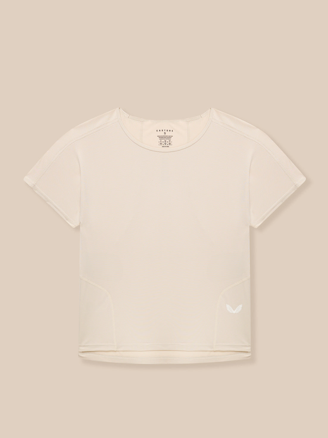 Flat lay back view of beige Flow Training T Shirt with neck tag and small wing logo at hem.