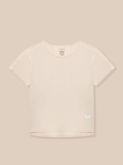 Flat lay back view of beige Flow Training T Shirt with neck tag and small wing logo at hem.