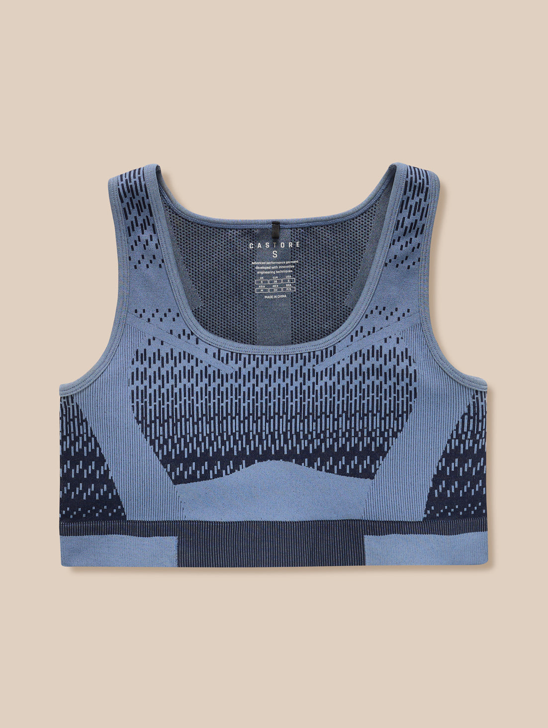 Front view of Flow Training Seamless Crop Sports Bra in Midnight Navy showing knit pattern on a flat background.